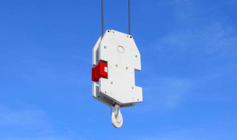 De sensoren op de trolley en het haakblok van de kraanhaak van het Wolff HiSPS systeem
